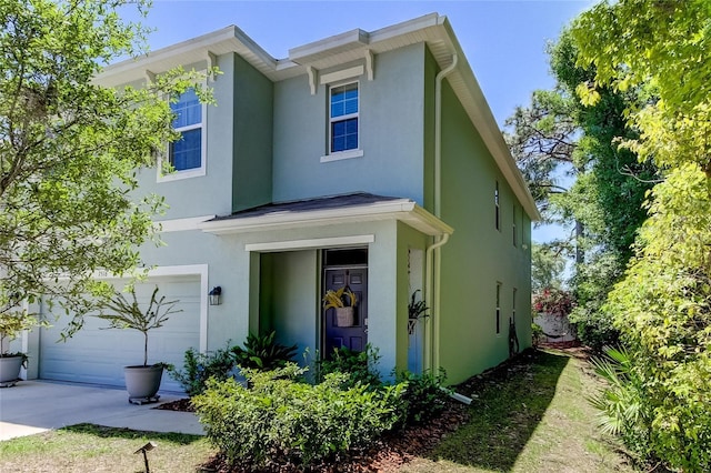 view of front of home with a garage