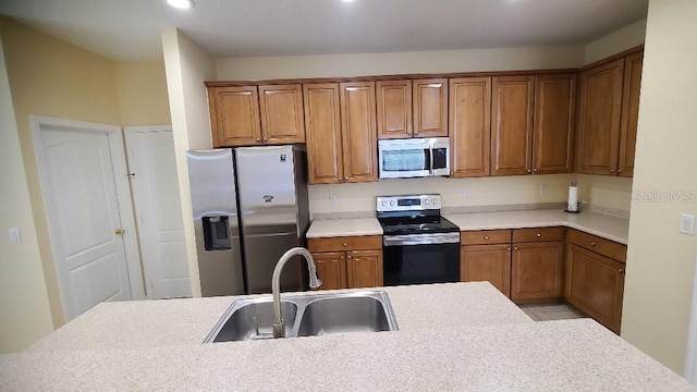 kitchen featuring sink and appliances with stainless steel finishes