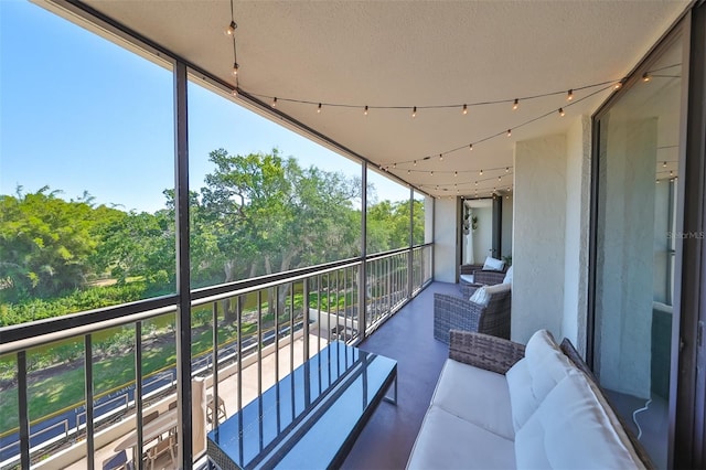 balcony with an outdoor hangout area