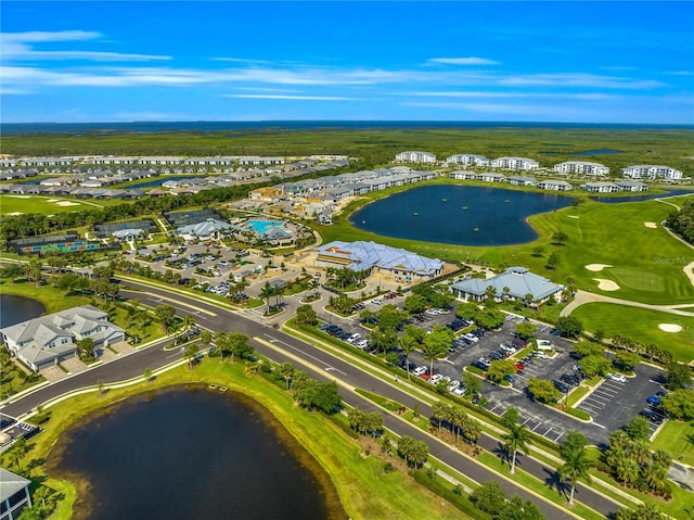 drone / aerial view with a water view