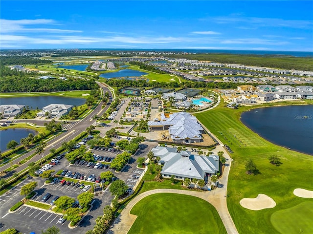 drone / aerial view with a water view