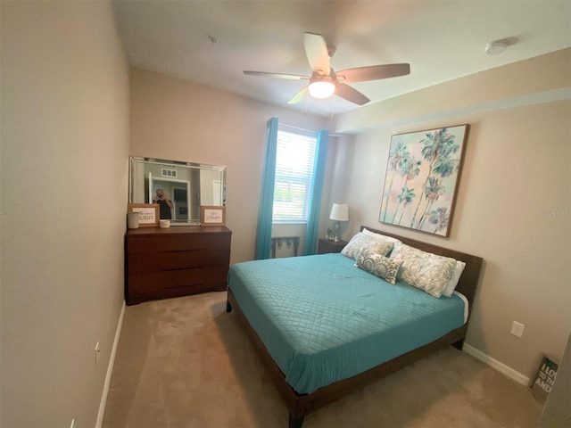 bedroom featuring carpet flooring and ceiling fan