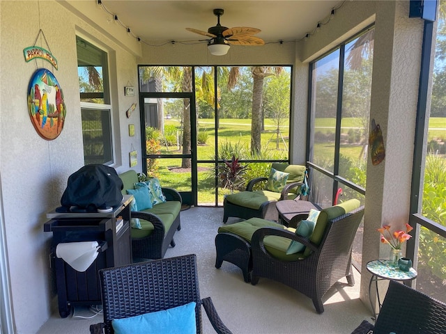 sunroom / solarium with ceiling fan