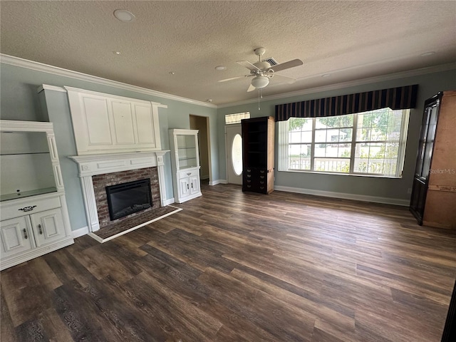 unfurnished living room featuring ceiling fan, dark hardwood / wood-style flooring, and a textured ceiling