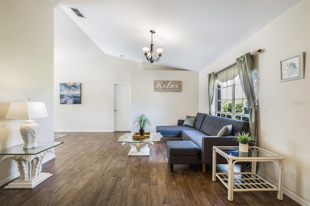 living room featuring vaulted ceiling, dark hardwood / wood-style floors, and an inviting chandelier