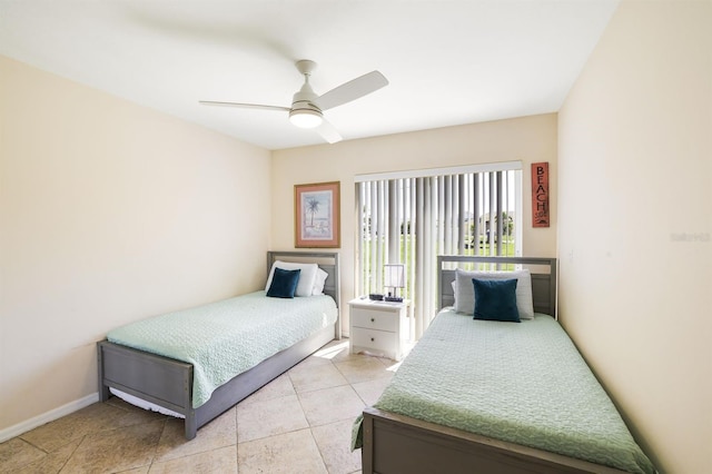 bedroom with ceiling fan and light tile floors