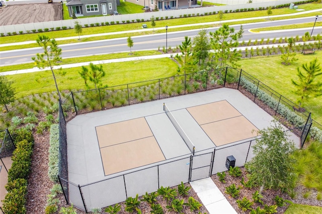view of patio / terrace featuring tennis court