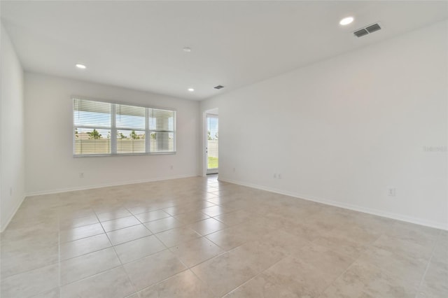 view of tiled spare room