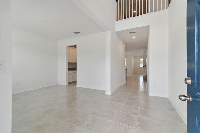 interior space with light tile patterned floors