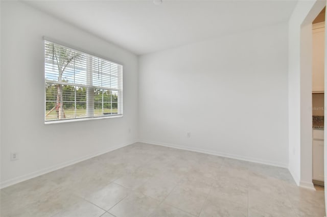 view of tiled empty room