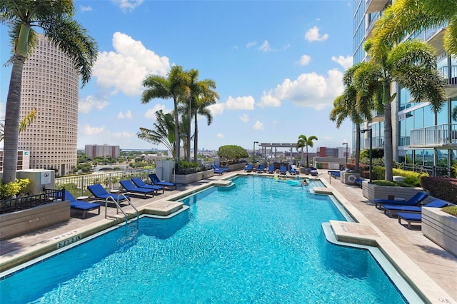 view of swimming pool featuring a patio