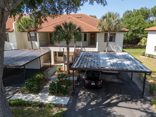 view of front of house featuring a carport