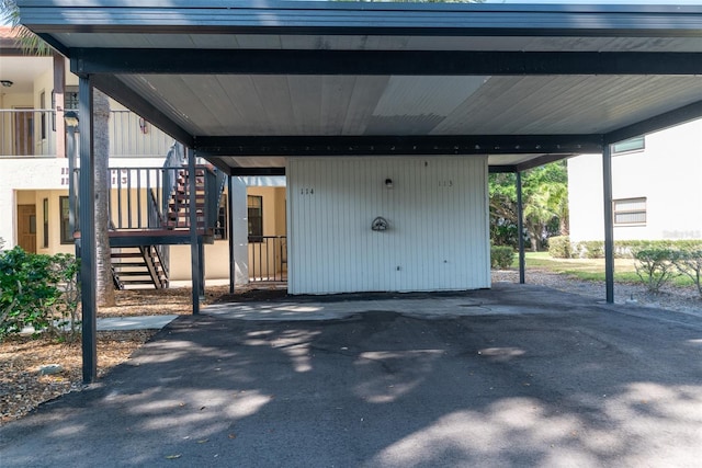 view of terrace with a carport