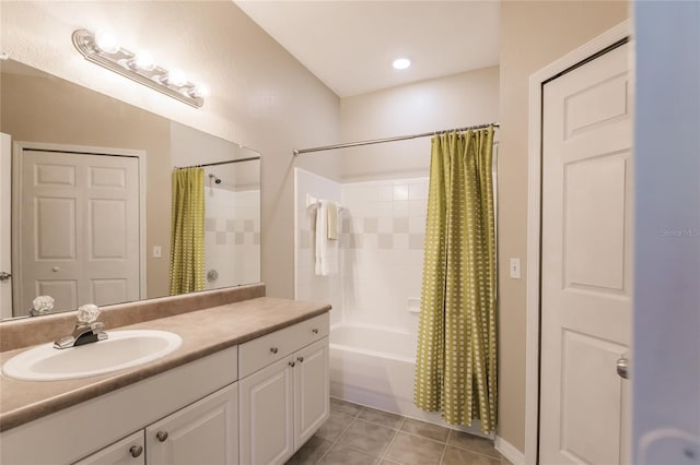 bathroom featuring vanity, shower / tub combo, and tile patterned floors