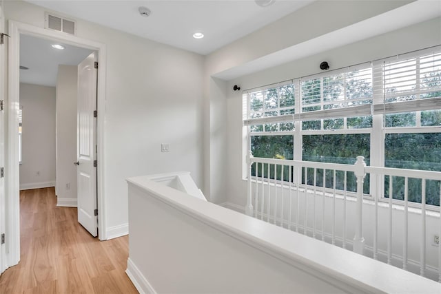 hall featuring light hardwood / wood-style floors