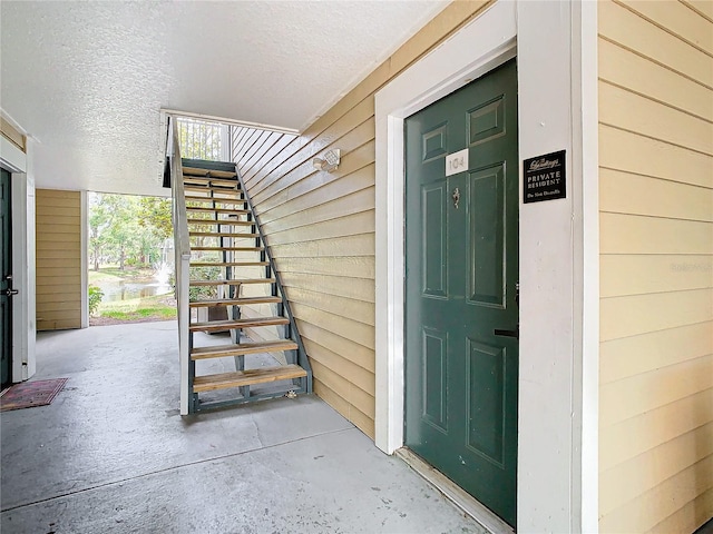 property entrance featuring covered porch