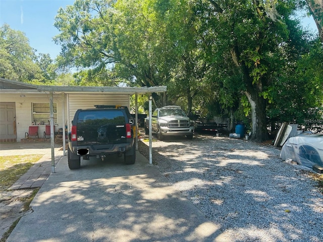 view of car parking featuring a carport