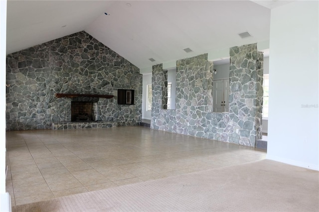 unfurnished living room featuring tile flooring, a fireplace, and lofted ceiling