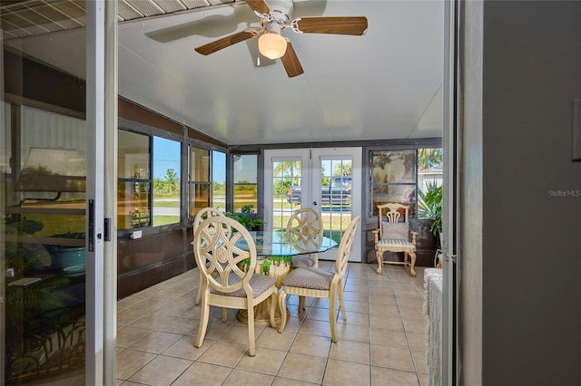 sunroom featuring french doors and ceiling fan