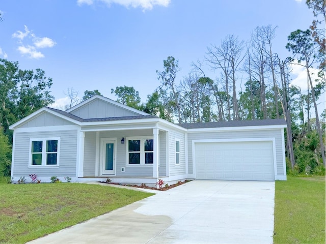 single story home with a garage and a front yard