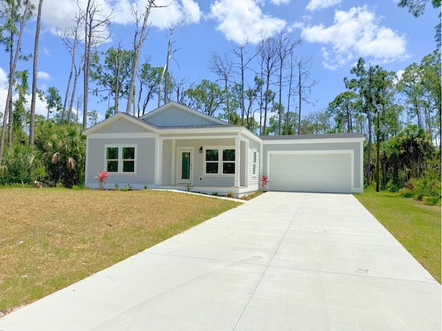 ranch-style home featuring a garage and a front lawn