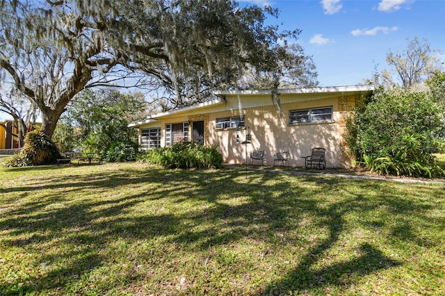 view of front of home with a front yard