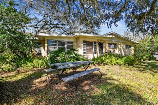 view of front of home with a front yard