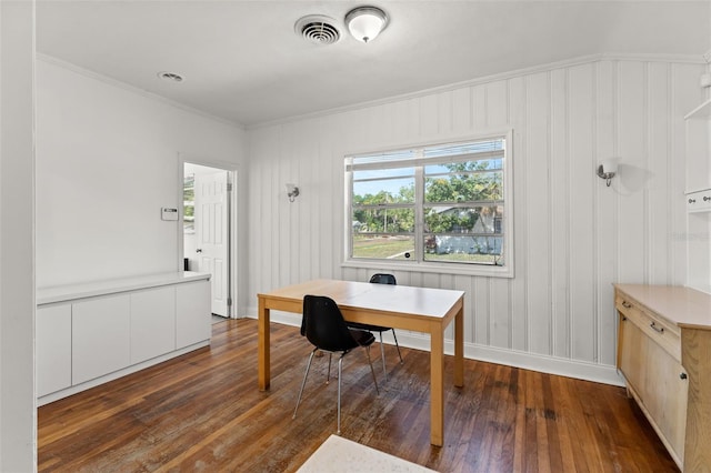 office area with ornamental molding and dark hardwood / wood-style flooring