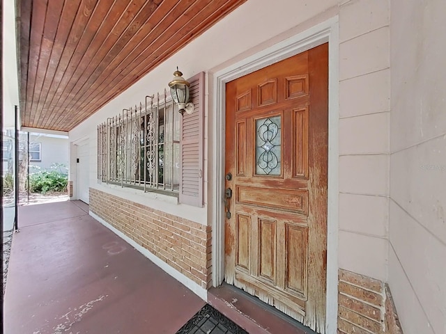 entrance to property with a porch