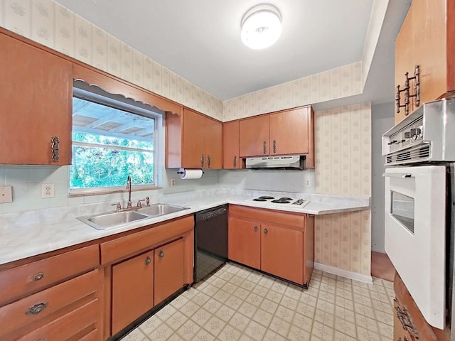 kitchen with white appliances, sink, and light tile floors