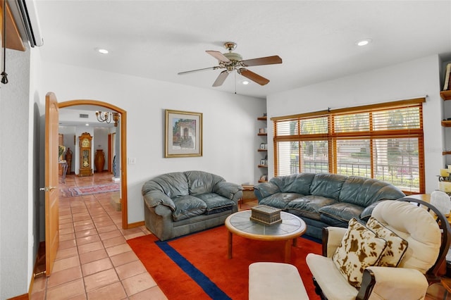 tiled living room featuring ceiling fan