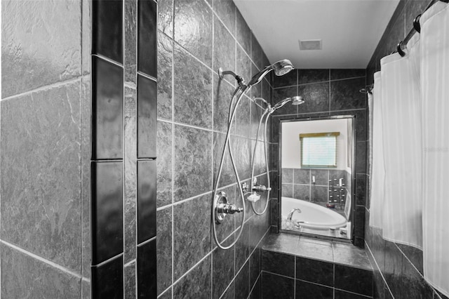 bathroom featuring separate shower and tub and lofted ceiling