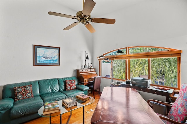 living room with ceiling fan and hardwood / wood-style floors