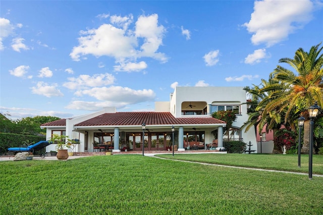 view of home's community with a lawn