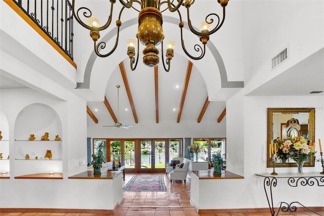 interior space featuring ceiling fan, tile patterned flooring, french doors, high vaulted ceiling, and beamed ceiling