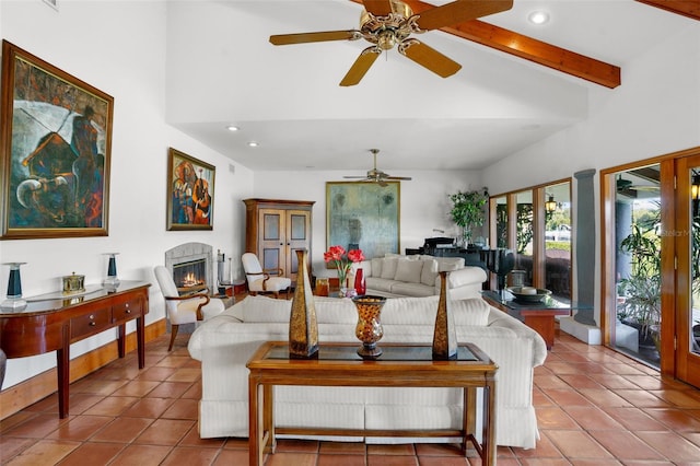 tiled living room featuring ceiling fan and vaulted ceiling with beams