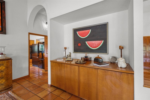 interior space featuring light tile patterned floors