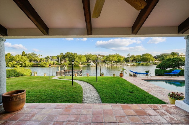 view of patio with a water view