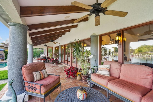 view of patio featuring a water view