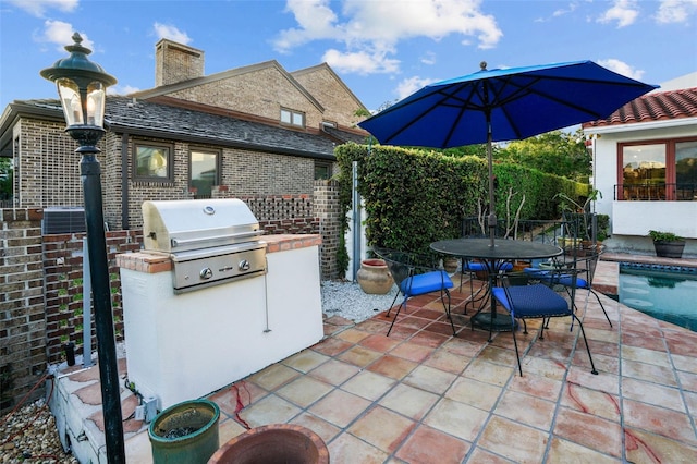 view of patio with area for grilling