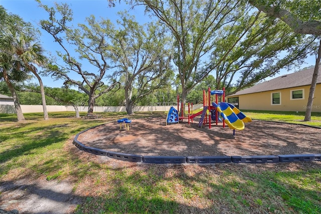 view of jungle gym with a yard