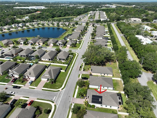 drone / aerial view with a water view