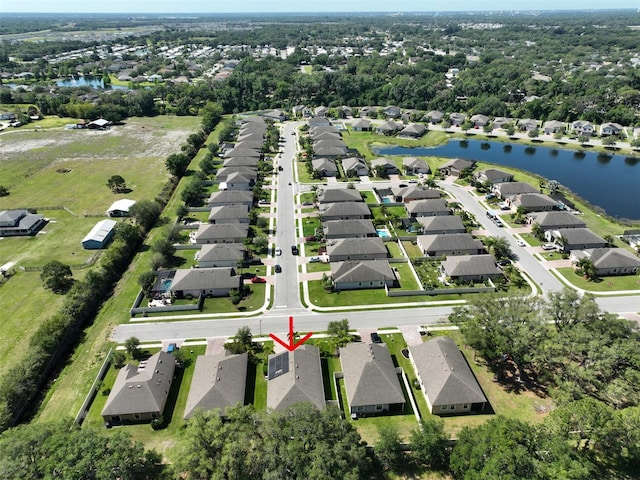 birds eye view of property featuring a water view