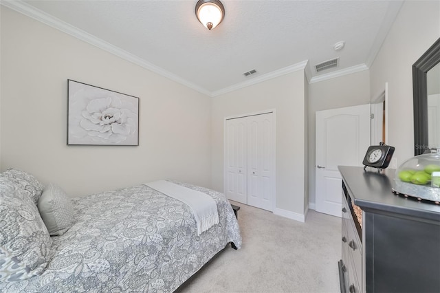 bedroom with crown molding, light carpet, and a closet