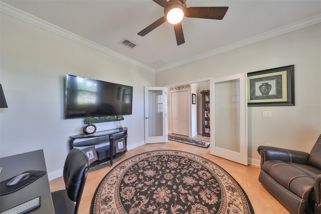 living room with ceiling fan, crown molding, and light tile floors