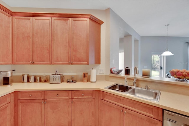 kitchen with dishwasher, pendant lighting, and sink