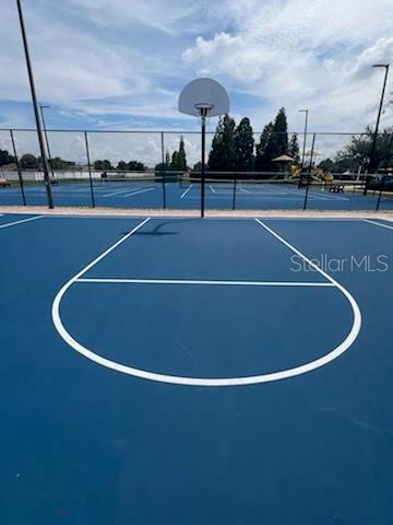 view of sport court with tennis court