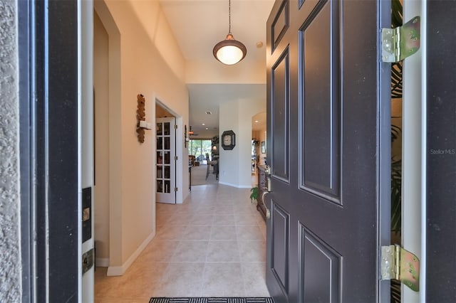 entryway with light tile flooring