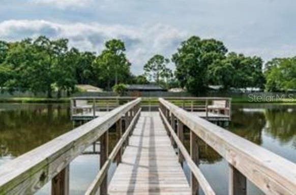 view of dock with a water view