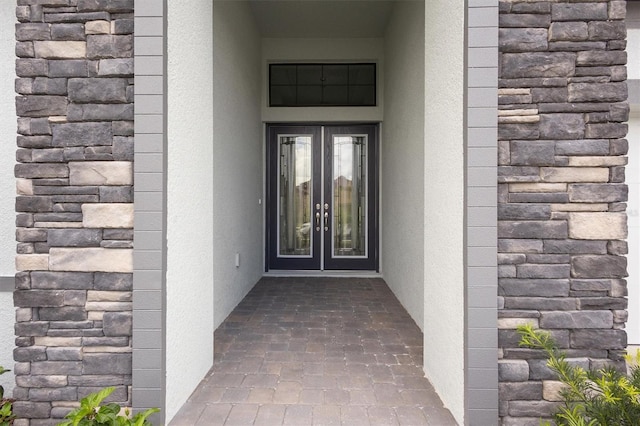 doorway to property with french doors